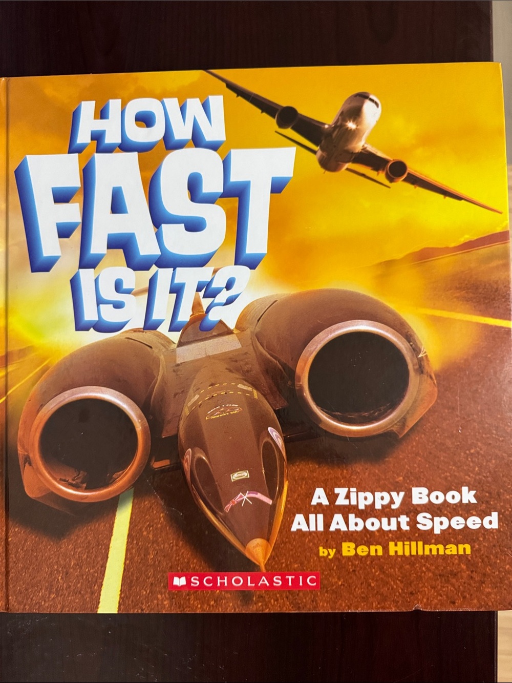 Scholastic "How Fast Is It?" Hardback Kids Book with tags